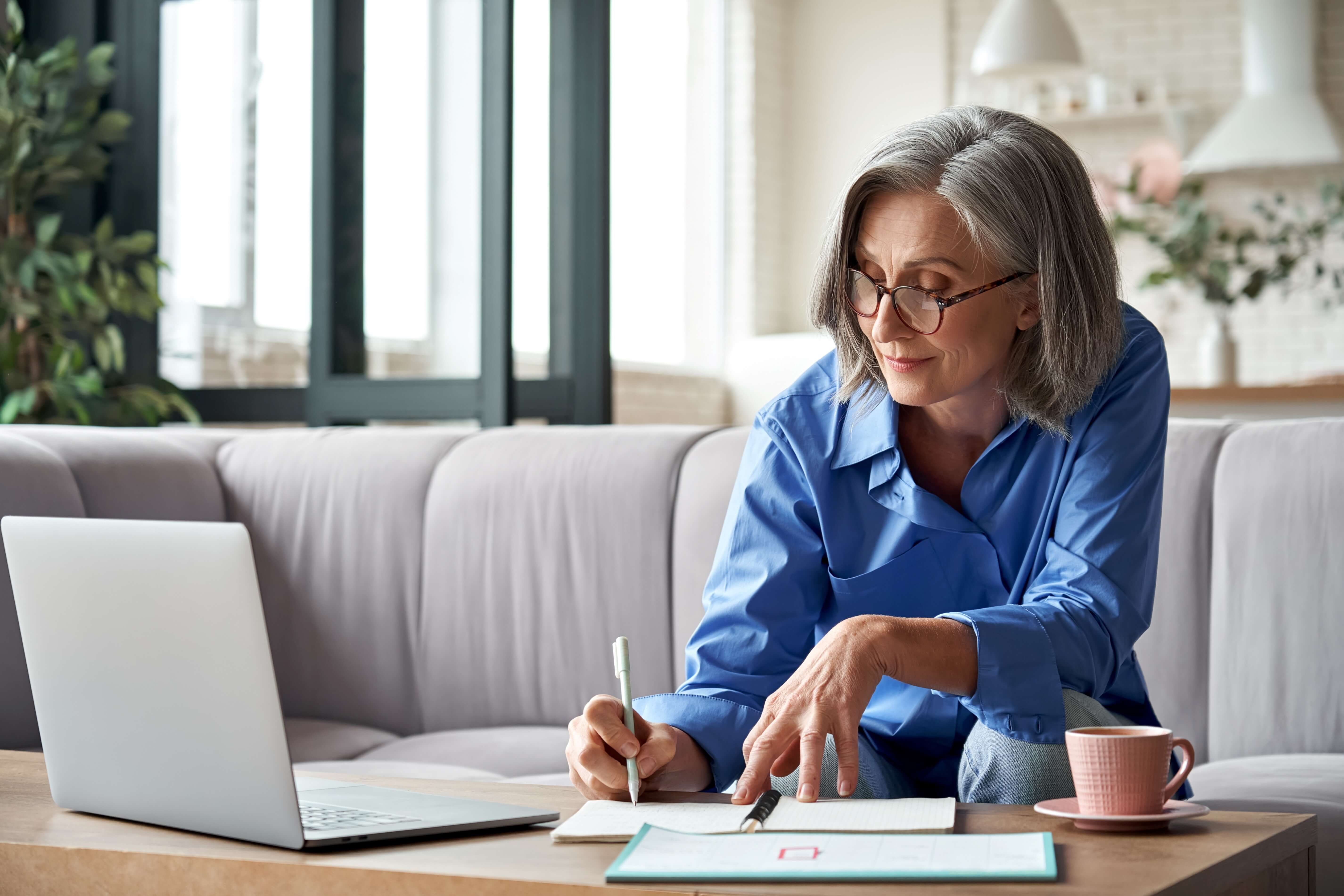 Chiropractor completing her online chiropractic ce from her living room